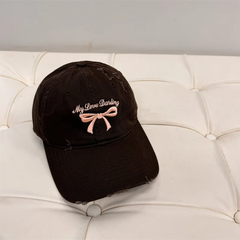 Damen Baseball Cap aus gewaschener Baumwolle mit Schleifenstickerei Skanto