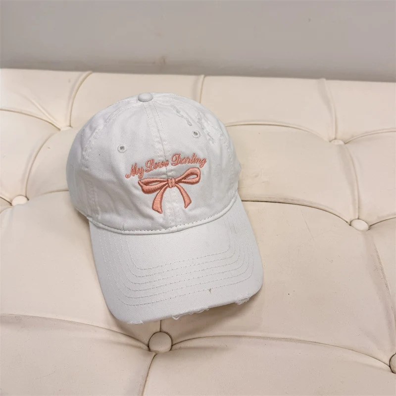 Damen Baseball Cap aus gewaschener Baumwolle mit Schleifenstickerei Skanto
