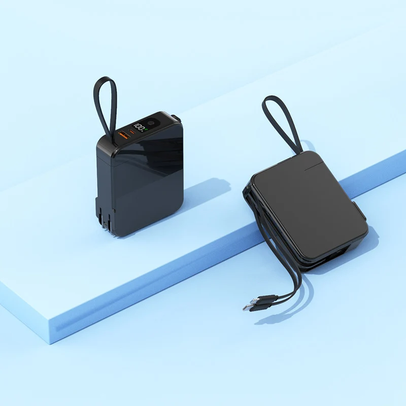 Tragbare Powerbank mit ausziehbarem Ladekabel und Digitalanzeige Skanto