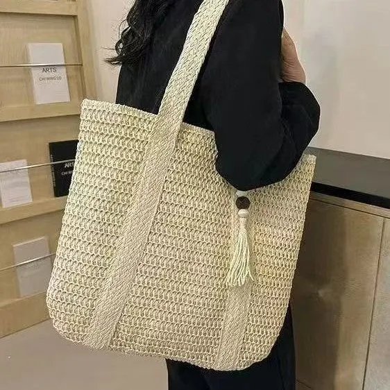 Natur gewebte Handtasche mit dekorativem Quastendetail Skanto
