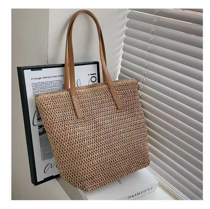 Handtasche aus gewebtem Naturmaterial mit Ledergriffen Skanto