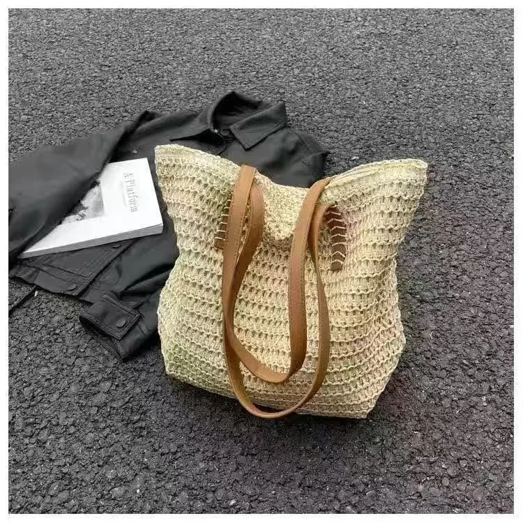 Handtasche aus gewebtem Naturmaterial mit Ledergriffen Skanto