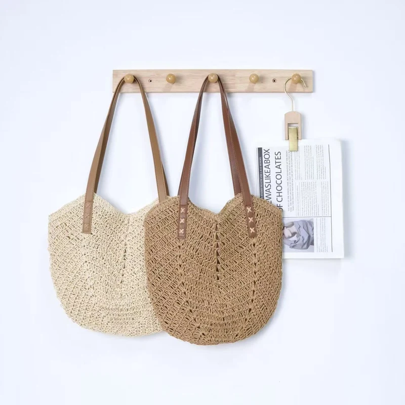 Handtasche aus gewebtem Naturmaterial mit eleganten Tragegriffen Skanto