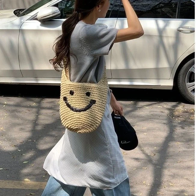 Handtasche mit lächelndem Motiv Skanto