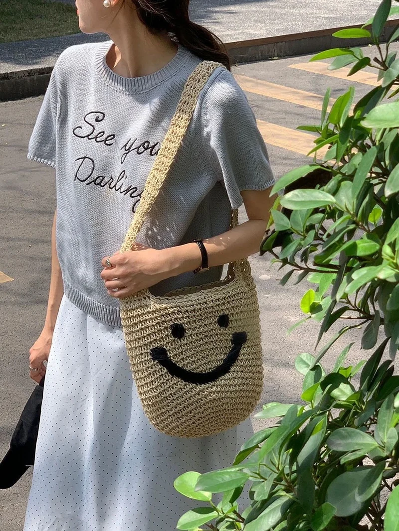 Handtasche mit lächelndem Motiv Skanto