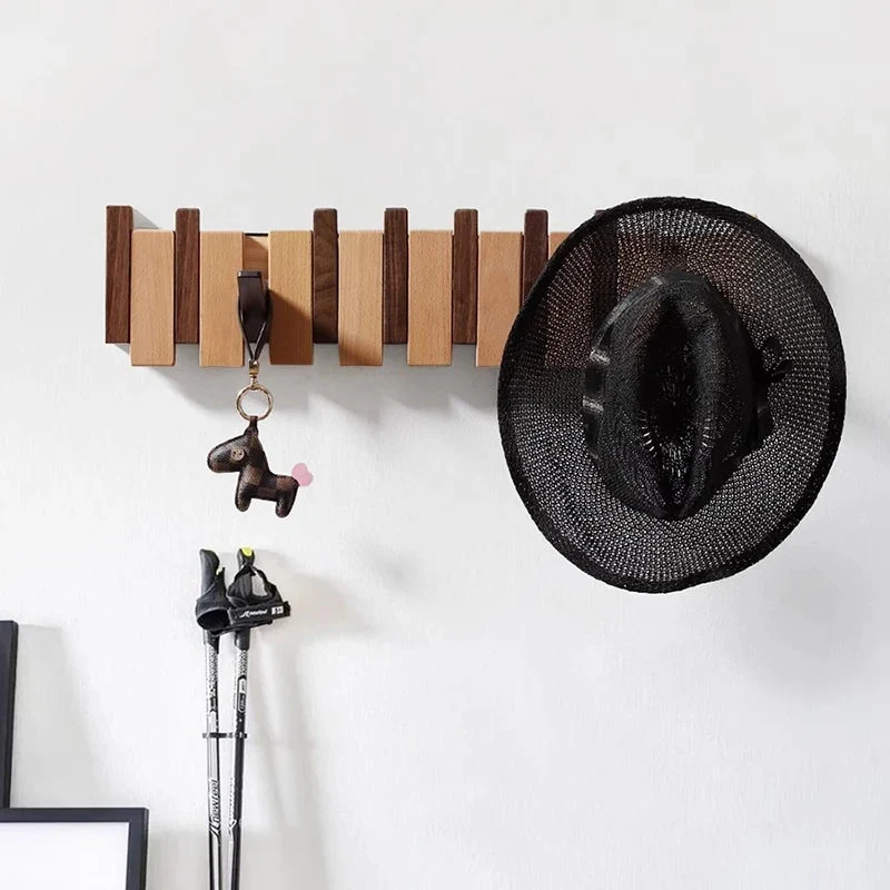 Wandgarderobe aus Holz im Klavierdesign mit klappbaren Haken | Skanto
