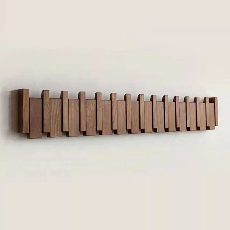 Wandgarderobe aus Holz im Klavierdesign mit klappbaren Haken | Skanto