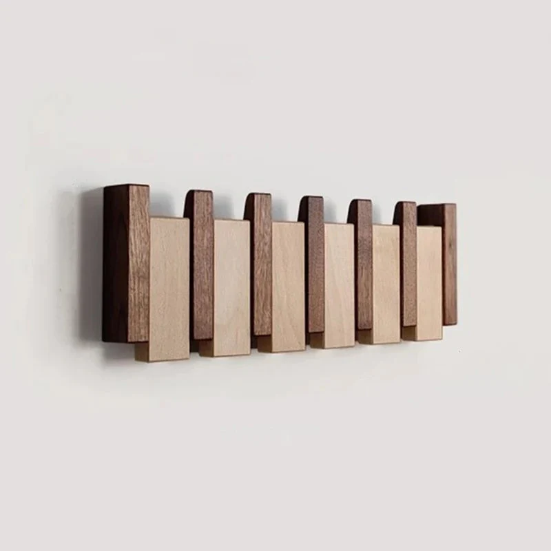 Wandgarderobe aus Holz im Klavierdesign mit klappbaren Haken | Skanto