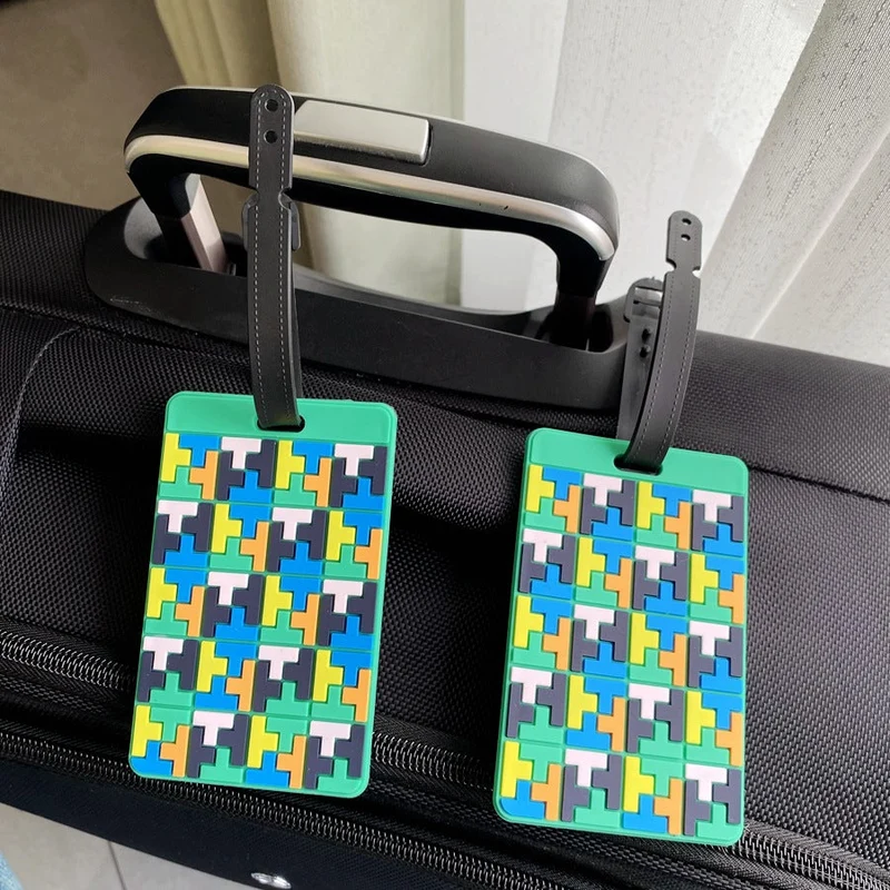 Lebhafter Puzzle-Muster Kofferanhänger Skanto
