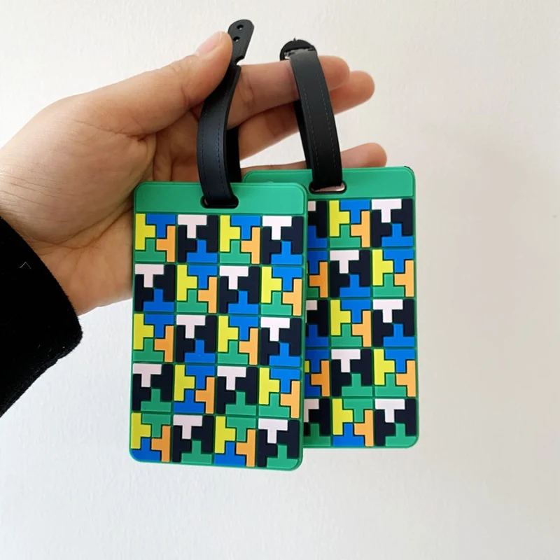 Lebhafter Puzzle-Muster Kofferanhänger Skanto